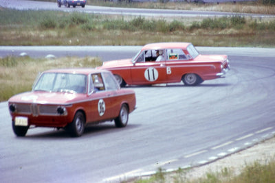 Celebrate Historic B-Sedan racing with a sideways Cortina and a BMW 2002 at Marlboro Raceway in 1967